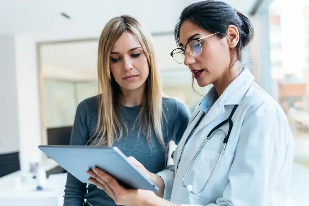 doctor and patient review test results.